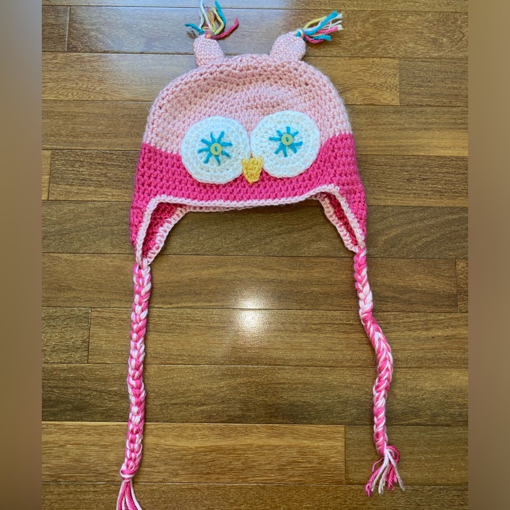 Crocheted pink owl hat